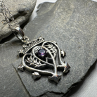 Amethyst Luckenbooth pendant necklace by Celtic Crystal Design Jewelry featuring a detailed Celtic knot design with a purple amethyst gemstone.