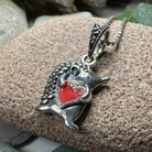 Hugs Hedgehog pendant necklace by Celtic Crystal Design Jewelry featuring a detailed hedgehog charm on a silver chain.