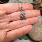 Celtic Crystal Design Jewelry Hugs Hedgehog necklace pendant featuring a charming hedgehog design in silver with intricate details.