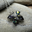Celtic Crystal Design Jewelry Mystic Topaz butterfly pendant necklace with intricate Celtic details and sparkling gemstone.