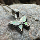 Pink opal butterfly pendant necklace by Celtic Crystal Design Jewelry, featuring a delicate petite butterfly motif.