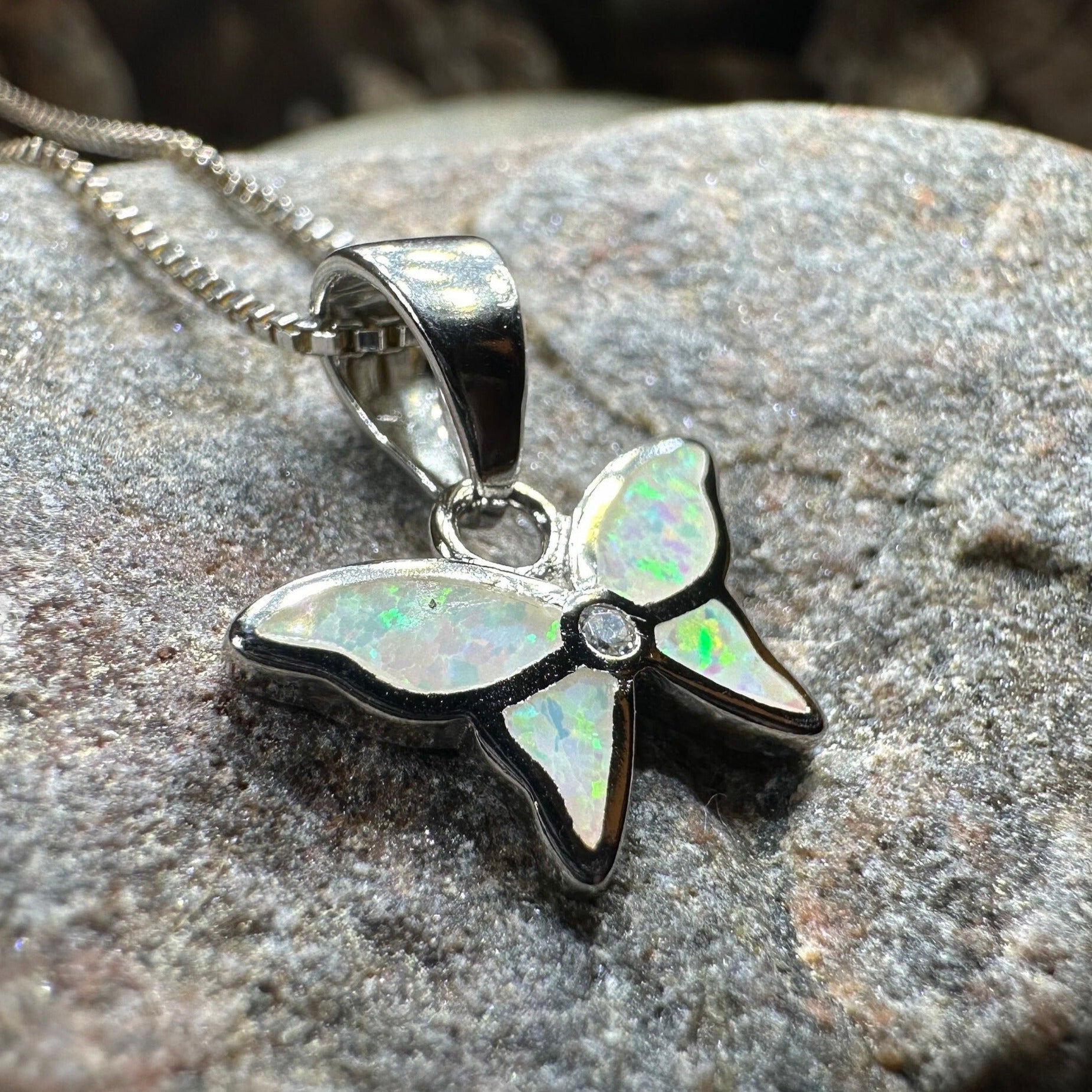 Pink opal butterfly pendant necklace by Celtic Crystal Design Jewelry, featuring a delicate petite butterfly motif.