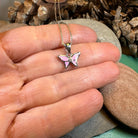 Petite pink opal butterfly pendant necklace by Celtic Crystal Design Jewelry, featuring a delicate opal butterfly charm.