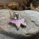 Petite pink opal butterfly pendant necklace by Celtic Crystal Design Jewelry, featuring a delicate butterfly-shaped pendant.