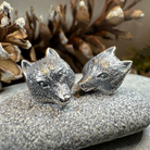 Forest Song Wolf Post Earrings by Celtic Crystal Design Jewelry, silver-tone wolf-themed post earrings with intricate Celtic patterns.
