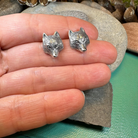 Forest Song Wolf Post Earrings by Celtic Crystal Design Jewelry featuring intricate wolf design in silver-tone metal.
