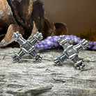 Springtide Saint Brigid's Cross Celtic crystal post earrings featuring intricate cross designs in silver-tone metal.