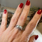 Celtic Crystal Design Jewelry butterfly ring featuring intricate Celtic patterns and sparkling crystal accents on a silver band.