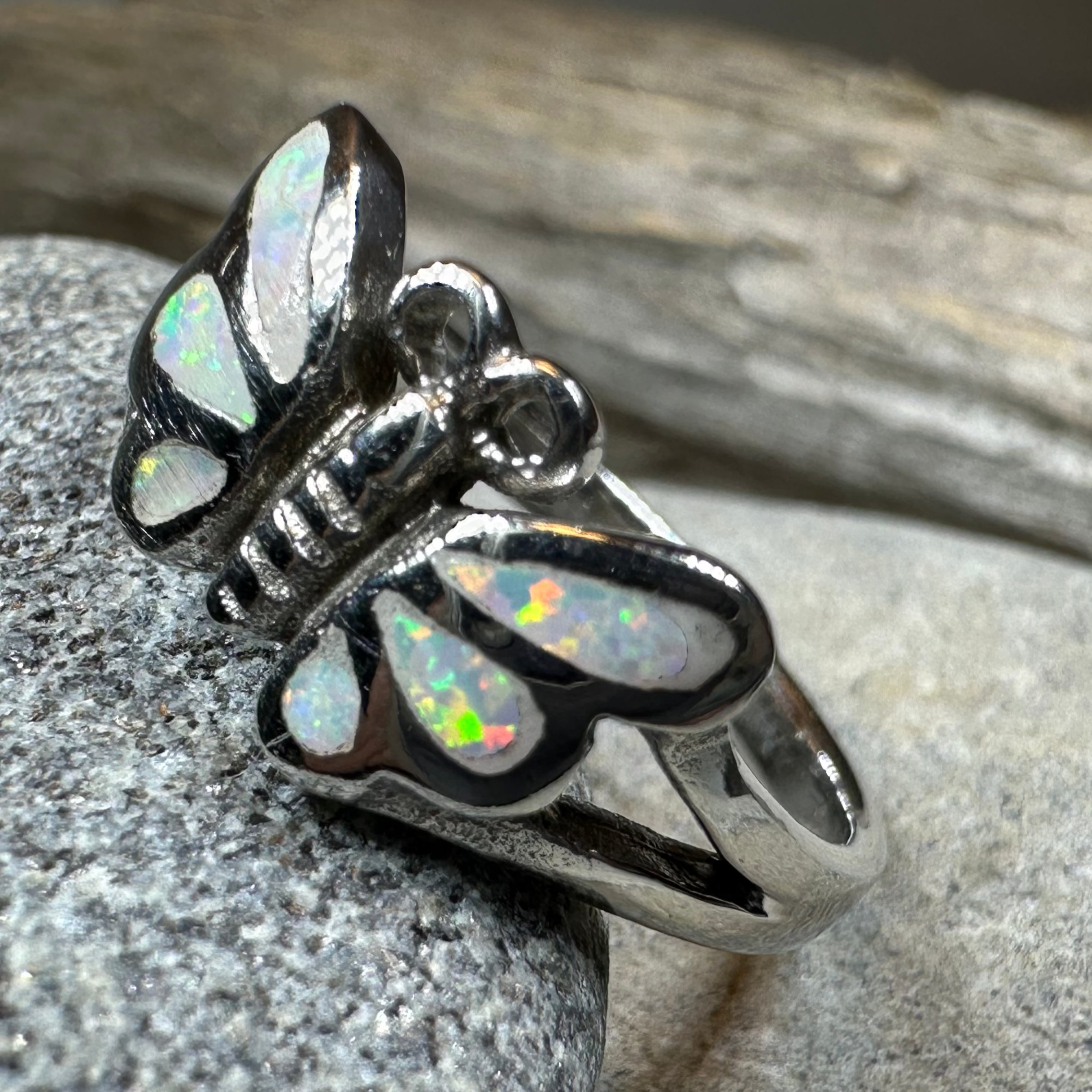 Celtic Crystal Design Jewelry butterfly ring with intricate Celtic patterns and sparkling crystal accents on a silver band.