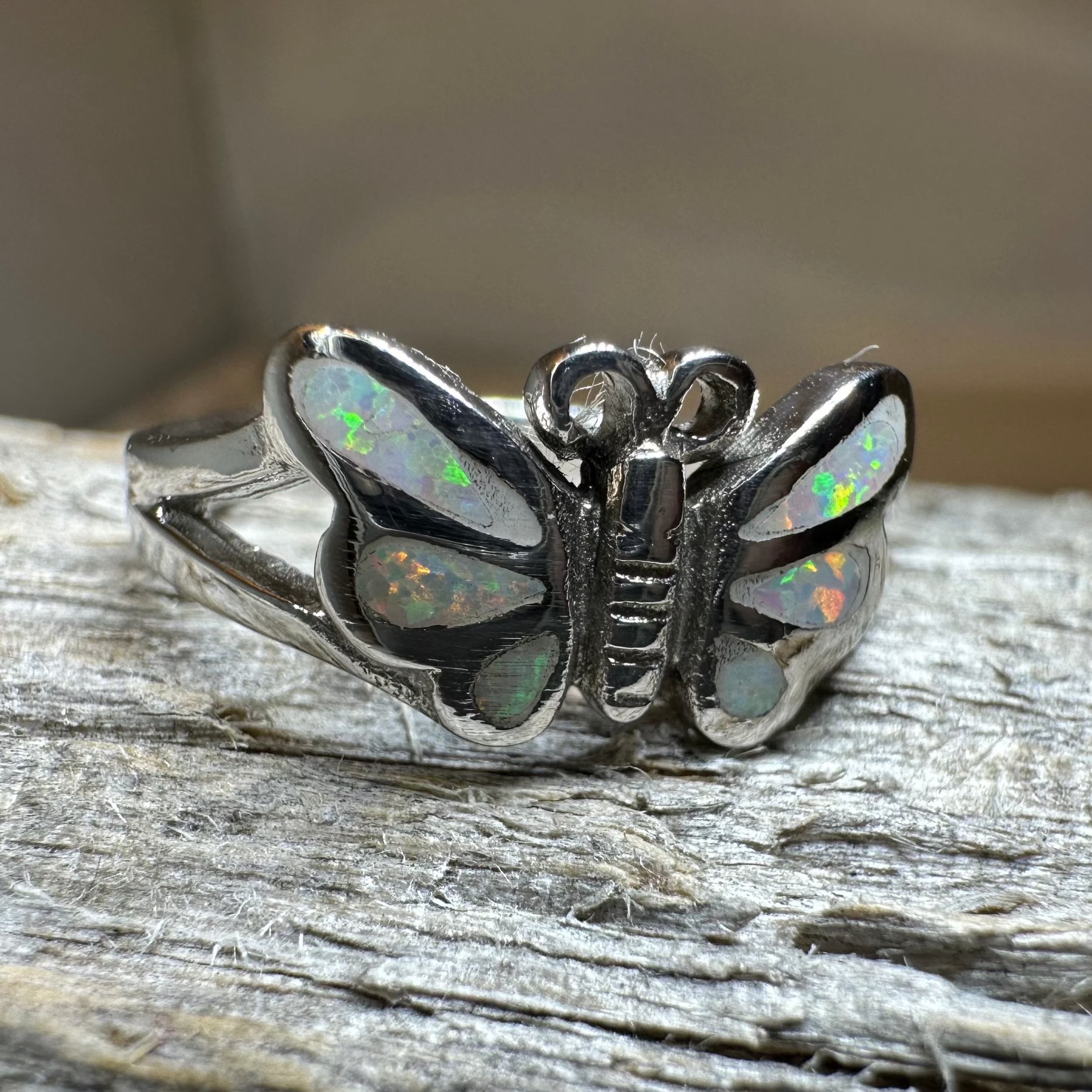 Celtic Crystal Design Jewelry butterfly ring featuring intricate Celtic patterns and sparkling crystal accents on silver band.