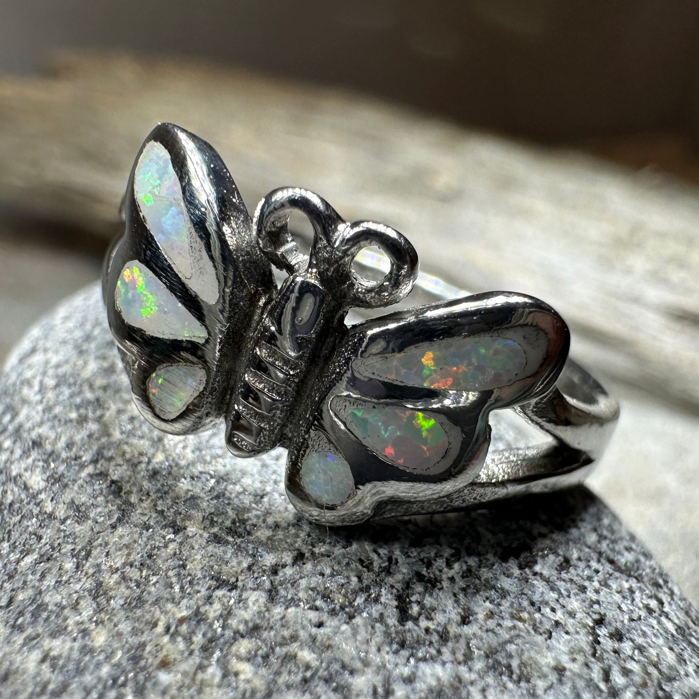 Silver butterfly ring by Celtic Crystal Design Jewelry featuring intricate Celtic patterns and sparkling crystal accents.