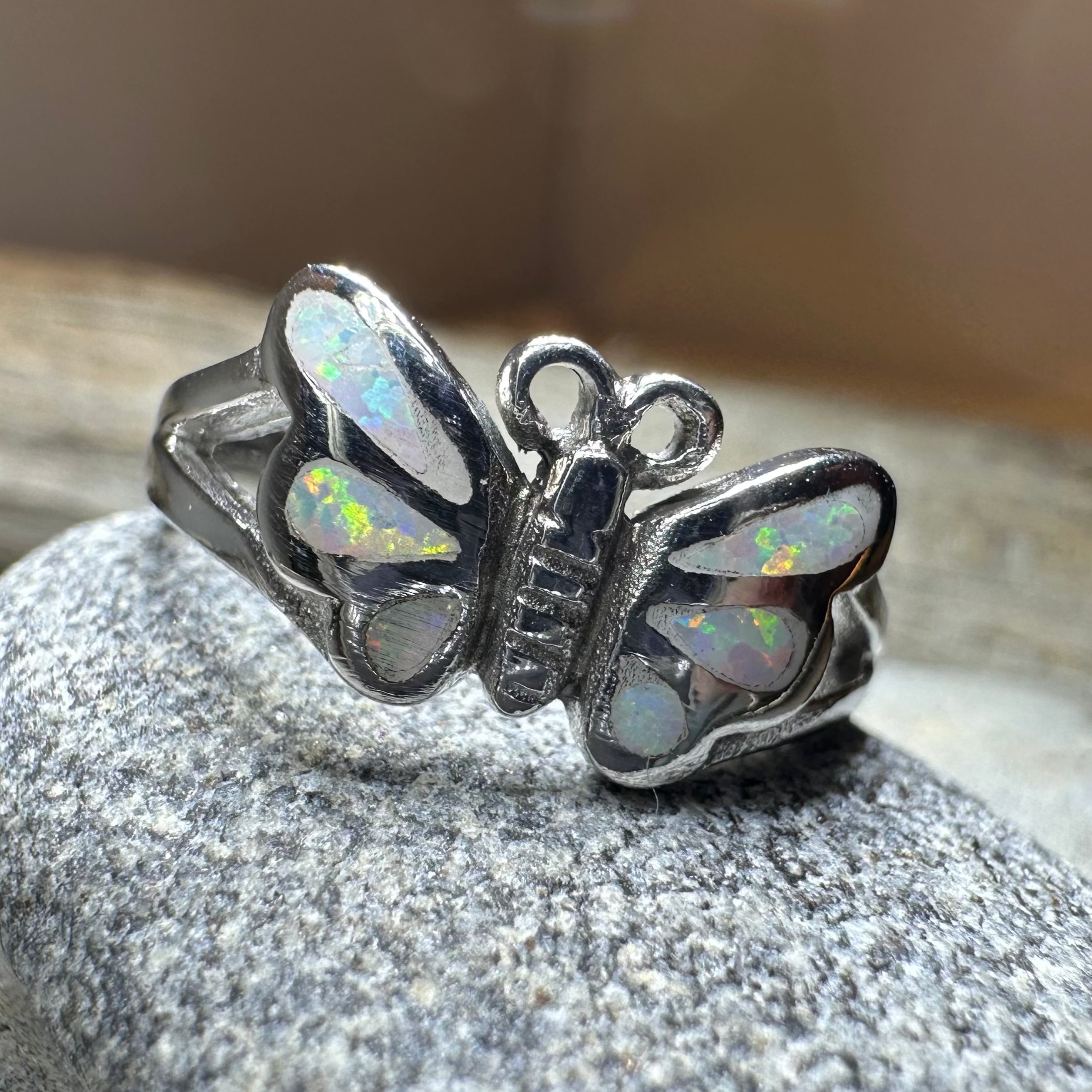 Celtic Crystal Design Jewelry butterfly ring with intricate Celtic patterns and sparkling crystal accents on silver band.