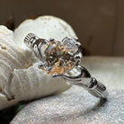 Celtic Crystal Design Jewelry Champagne Toast Claddagh Ring with detailed Celtic knotwork and sparkling crystal accents.