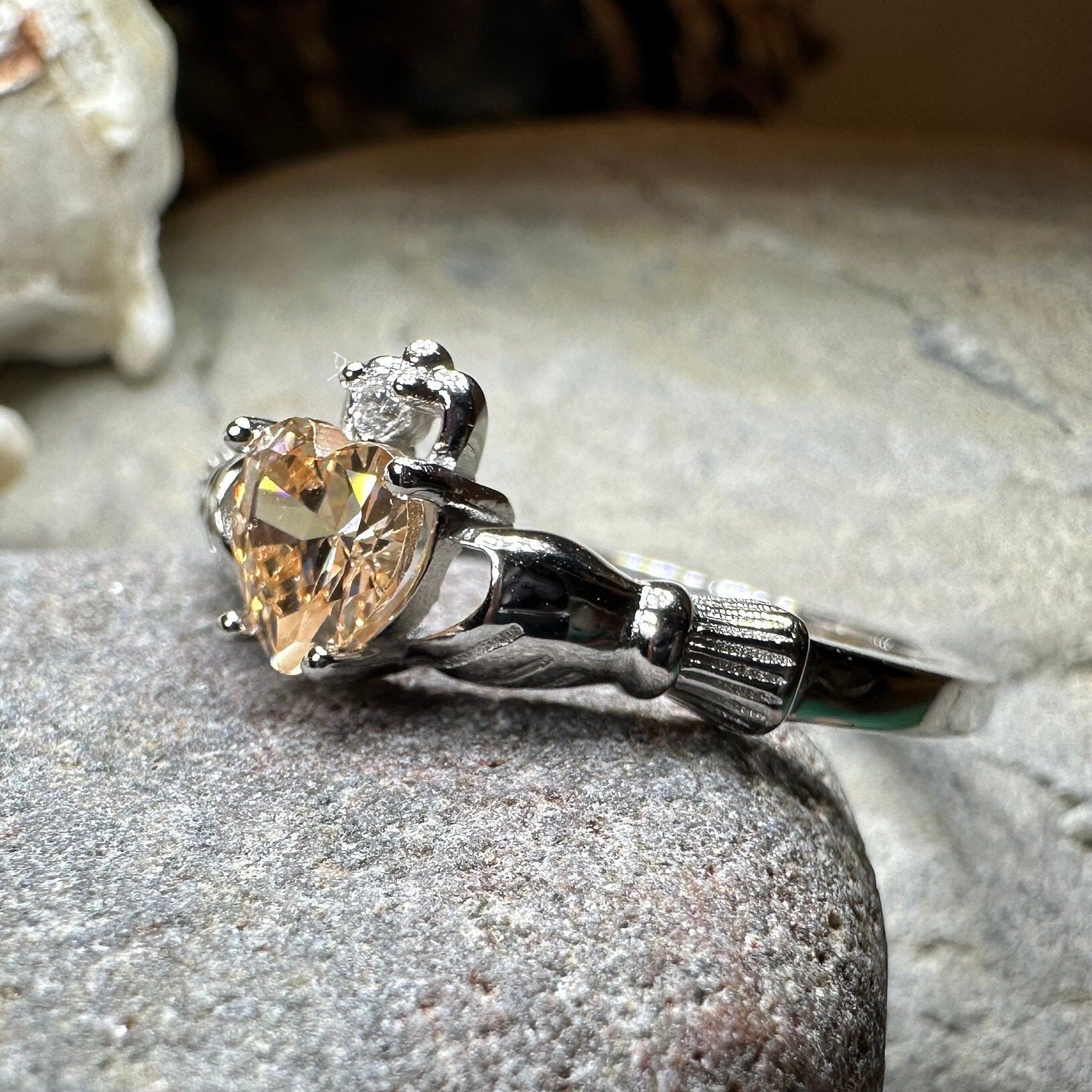 Celtic Crystal Design Jewelry Champagne Toast Claddagh Ring featuring a detailed gold-tone band and Claddagh design for elegant style.