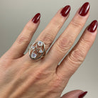 Celtic Crystal Design Jewelry moonstone infinity ring showcasing a polished moonstone gemstone and intricate Celtic pattern.