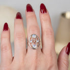 Celtic Crystal Design Jewelry moonstone infinity ring featuring a polished moonstone gemstone and intricate Celtic-inspired band design.