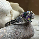 Celtic Crystal Design Jewelry Mystic Topaz Heart Ring featuring a sparkling heart-shaped topaz gemstone and intricate Celtic band design.