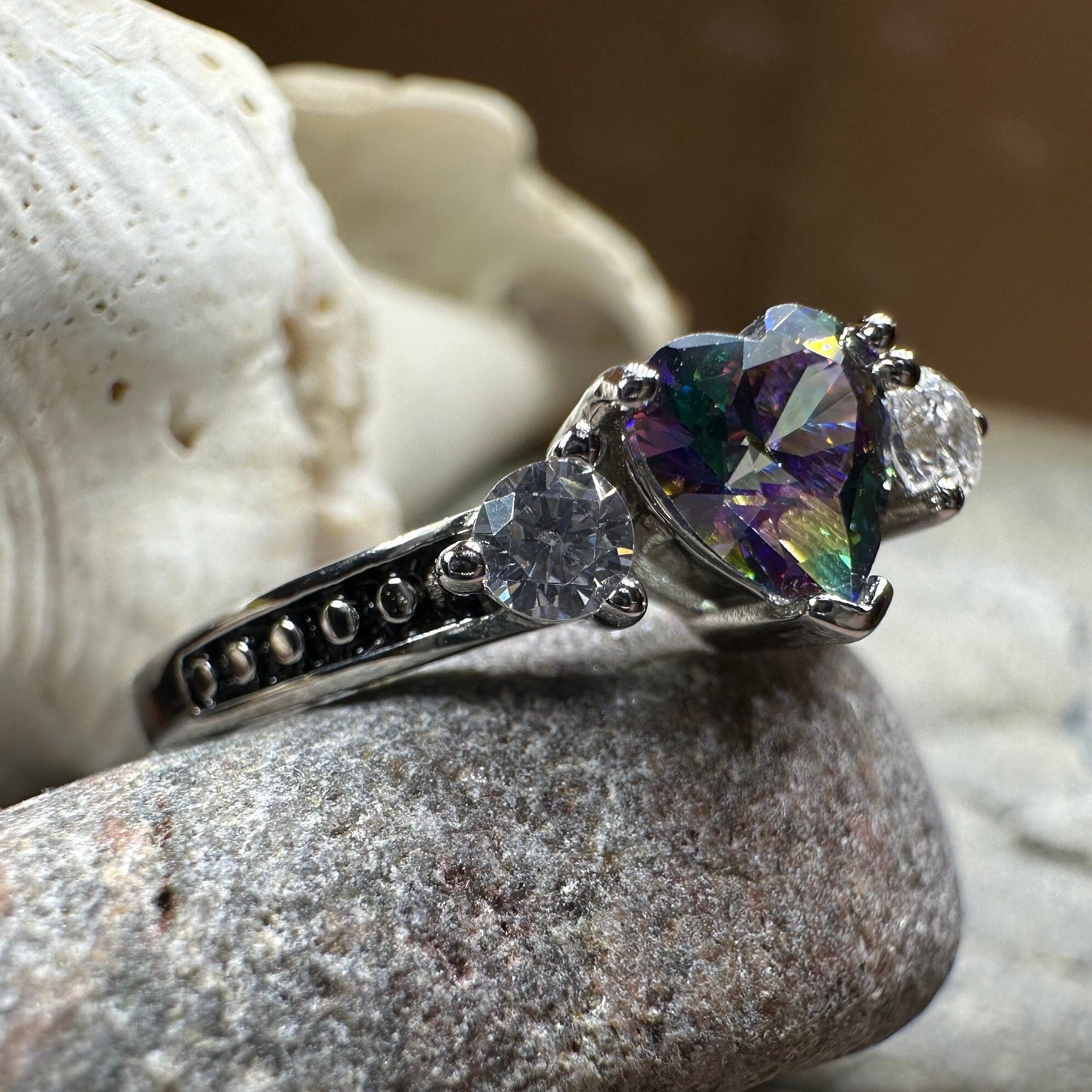 Celtic Crystal Design Jewelry Mystic Topaz Heart Ring featuring a sparkling heart-shaped topaz gemstone and intricate Celtic band design.