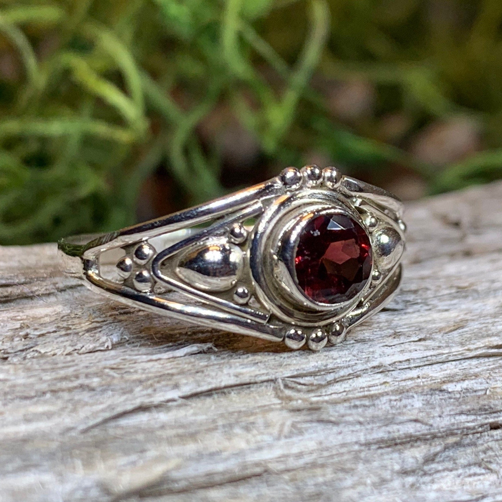 Klarina Celtic Ring by Celtic Crystal Design Jewelry featuring intricate Celtic patterns and a central amethyst gemstone.