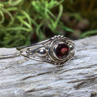 Klarina Celtic Ring by Celtic Crystal Design Jewelry featuring intricate Celtic patterns and a central amethyst gemstone.