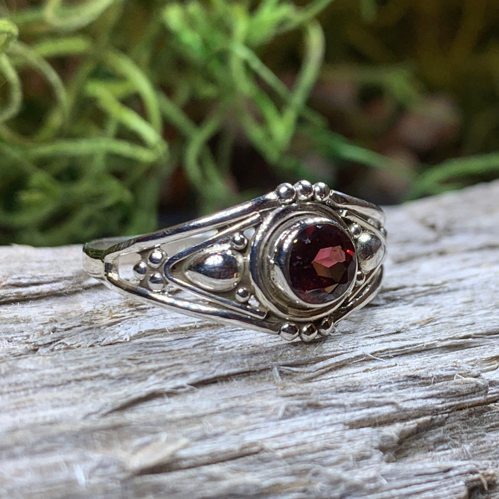 Klarina Celtic Ring by Celtic Crystal Design Jewelry featuring intricate Celtic patterns and a central amethyst gemstone.