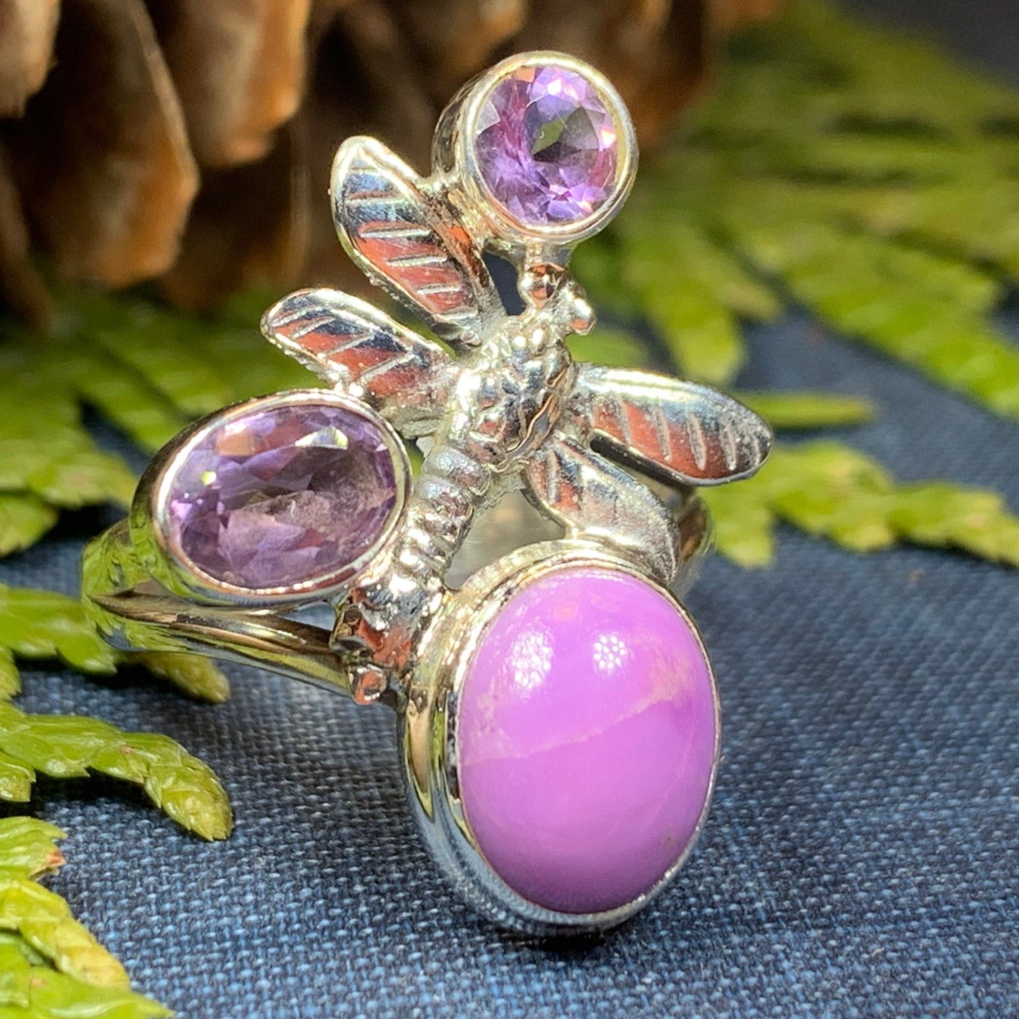 Celtic Crystal Design Jewelry dragonfly ring with ruby-colored stones, intricate Celtic patterns, and detailed metalwork.