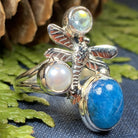 Celtic Crystal Design Jewelry dragonfly ring with colorful ruby tones, intricate Celtic pattern, and nature-inspired design.