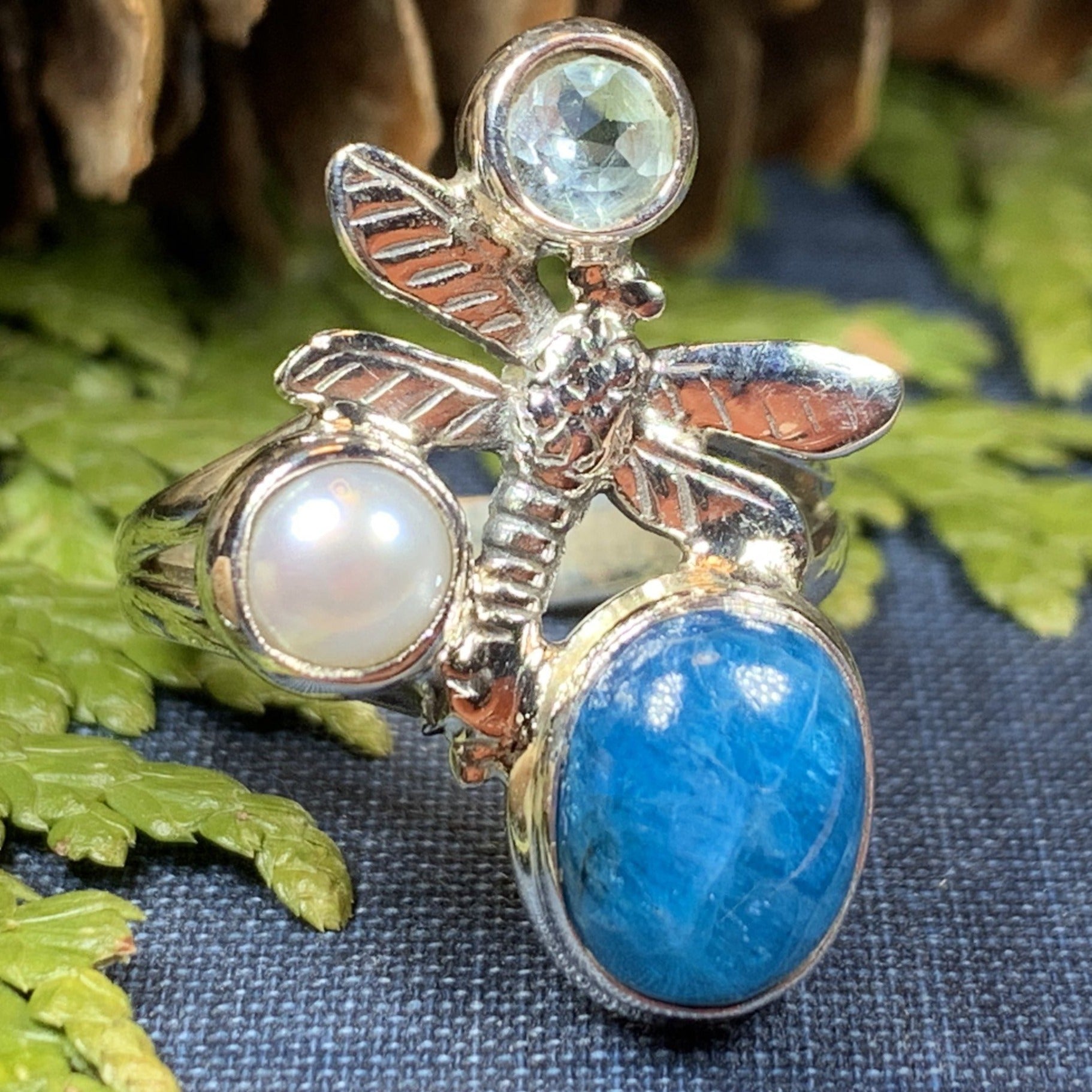 Colors of Nature Dragonfly Ring by Celtic Crystal Design Jewelry featuring vibrant ruby-colored dragonfly design in a detailed ring style.