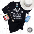 Cheers to Pour Decisions short sleeve graphic tee by The Graphic Tee, featuring fun, bold text design on soft fabric.