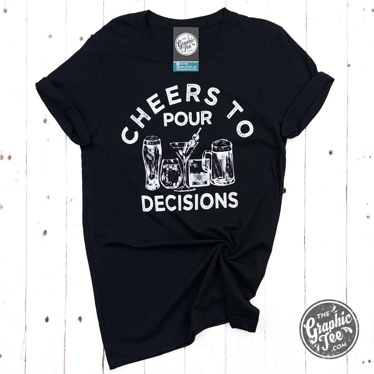 Cheers to Pour Decisions short sleeve graphic tee by The Graphic Tee, featuring a fun beer-themed design on soft cotton fabric.