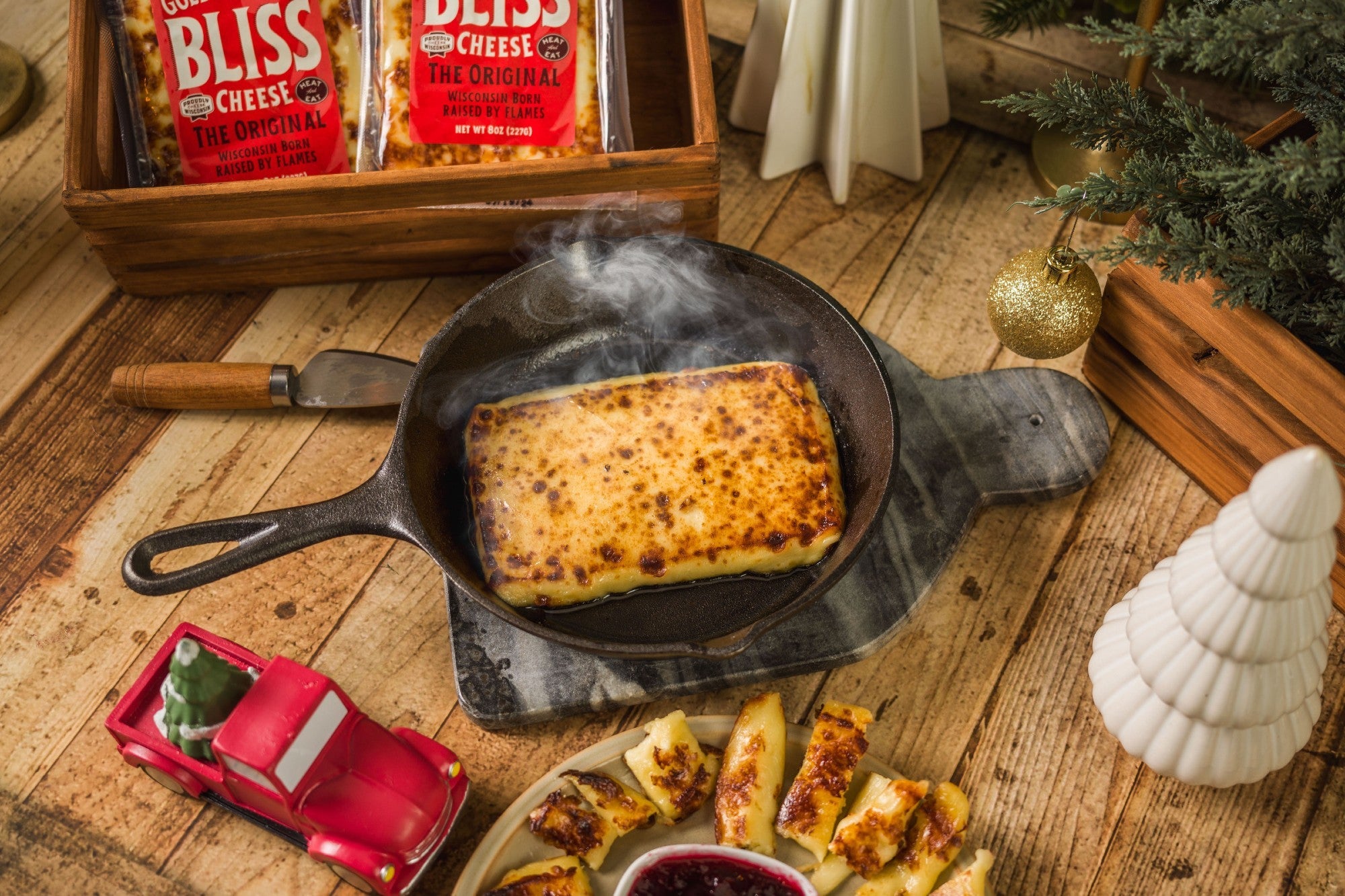 Golden Baked Bliss Cheese by Cheese Brothers, Inc. features a crispy baked cheese with a golden crust and melted, gooey interior.