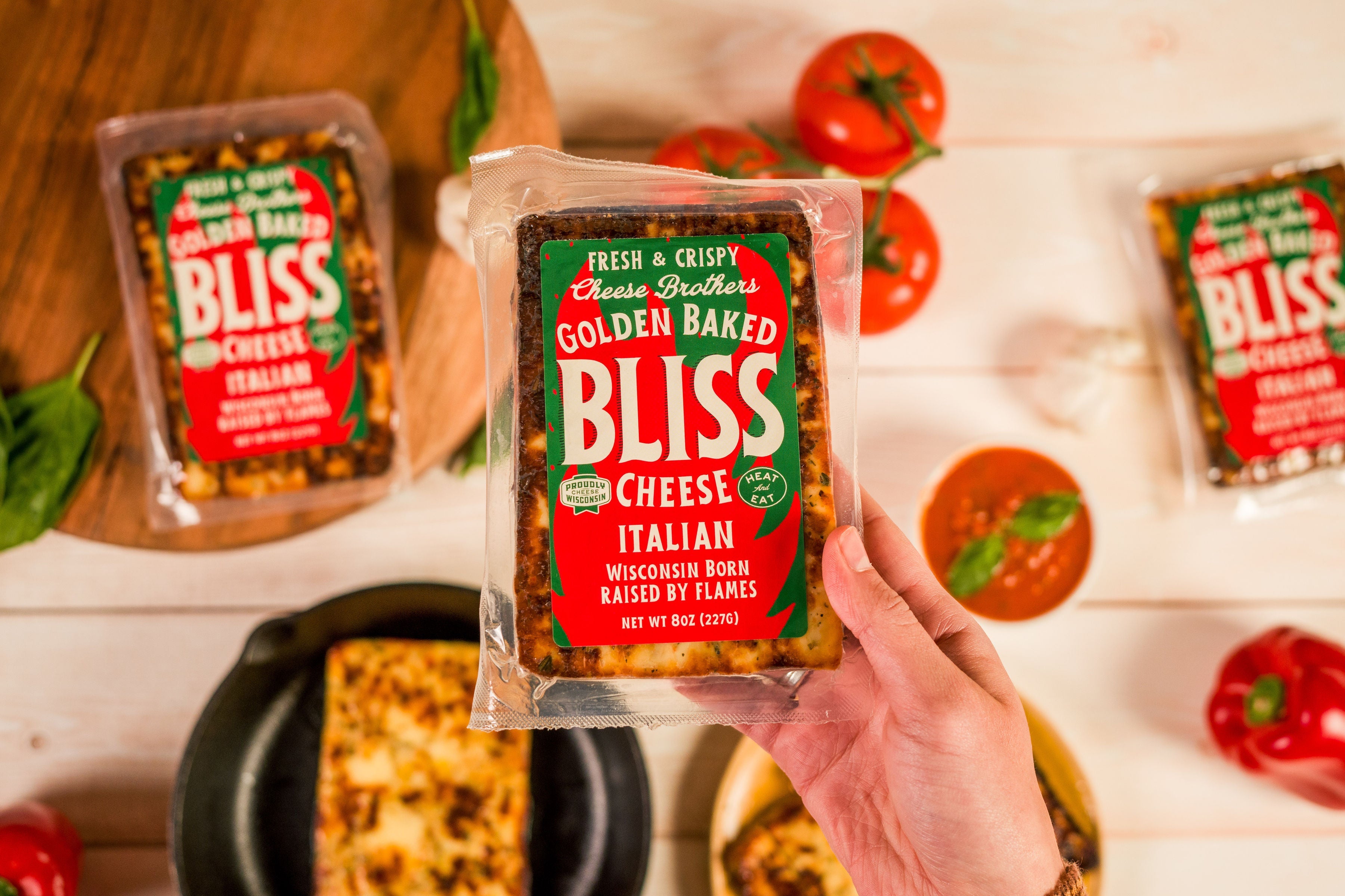 Italian Golden Baked Bliss Cheese by Cheese Brothers, Inc., featuring melted golden baked cheese with a crispy crust.