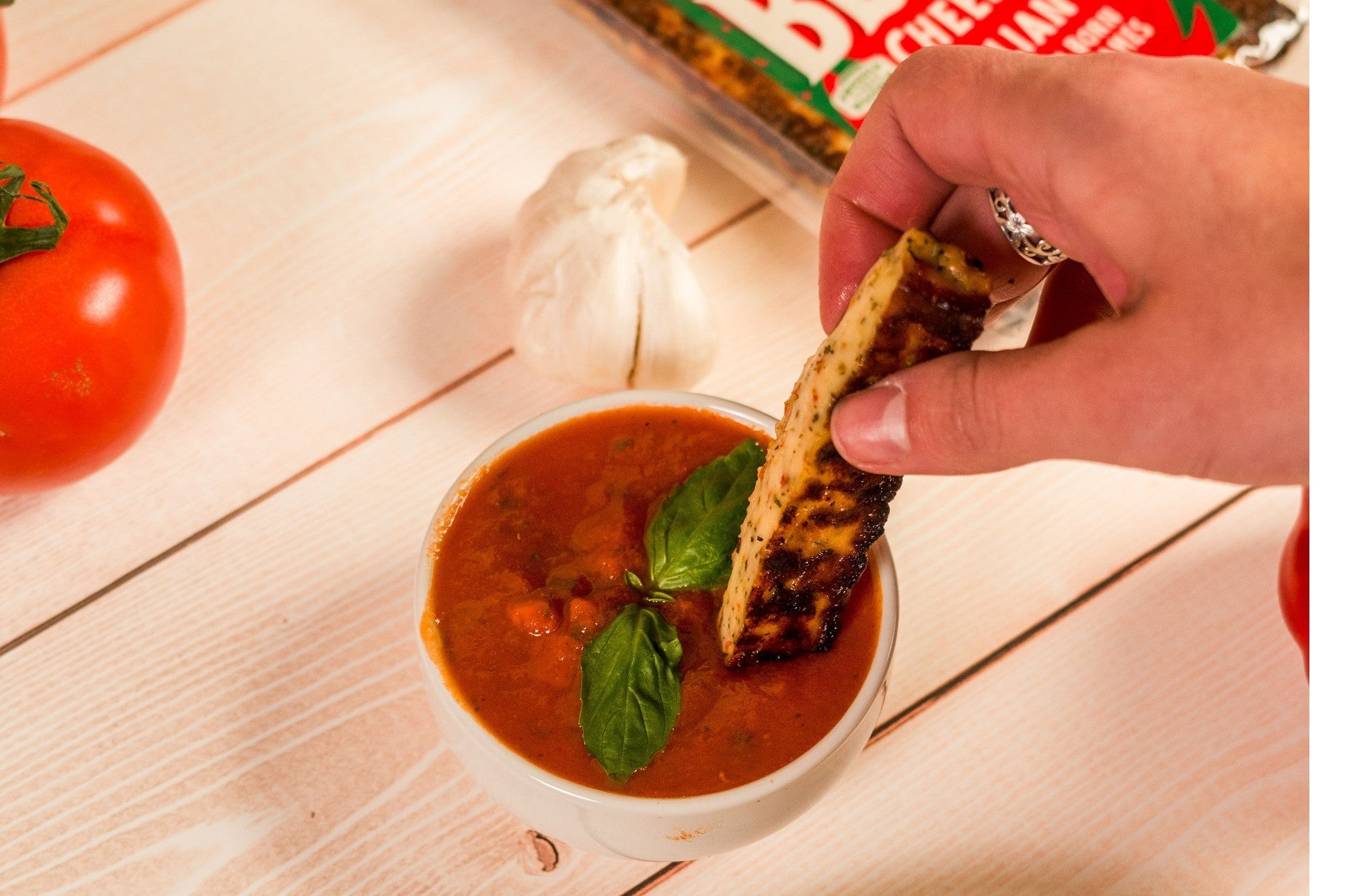 Golden baked Italian Bliss cheese from Cheese Brothers, Inc. melted and crispy with a rich, cheesy appearance.