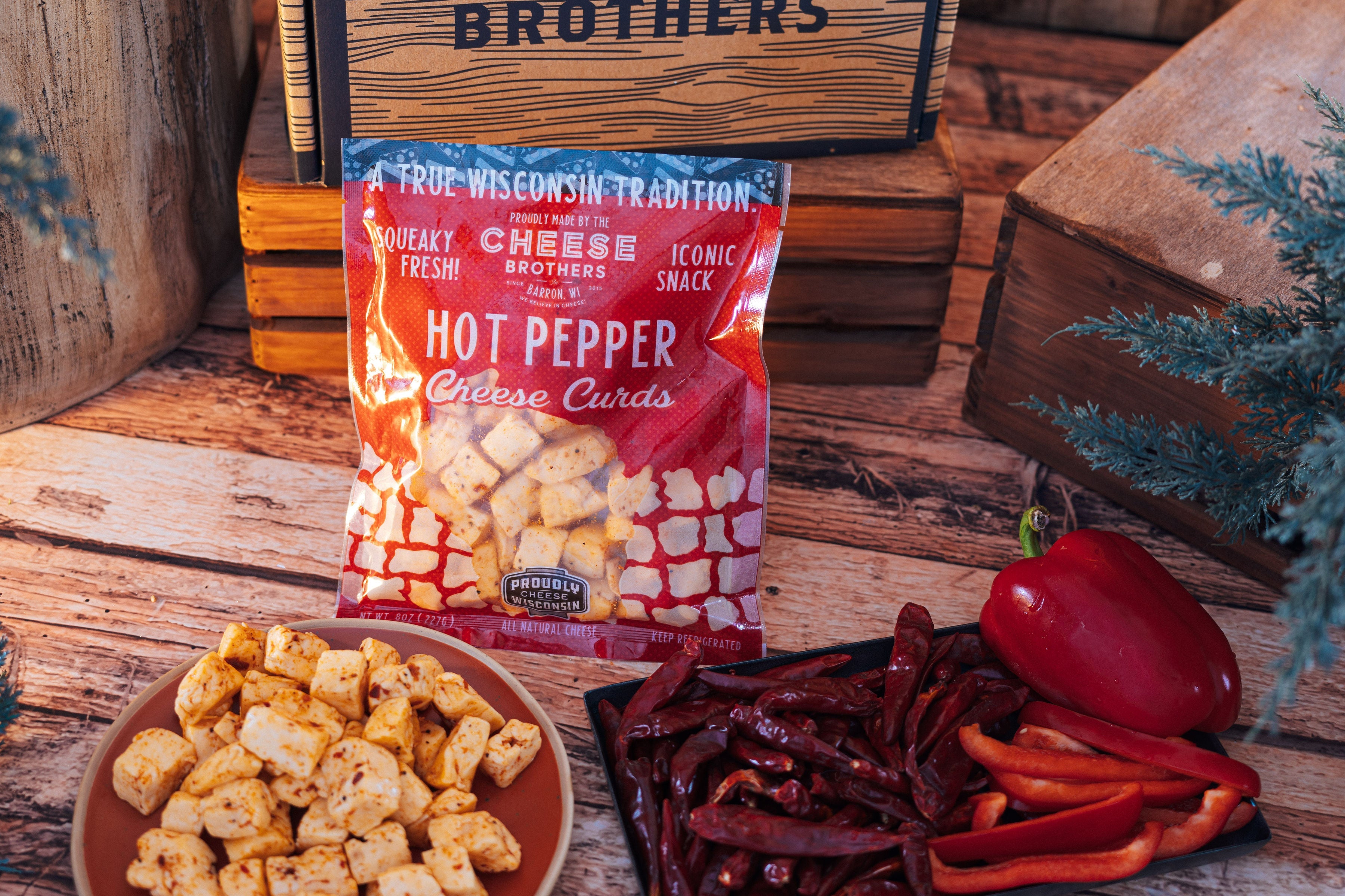 Cheese Brothers Inc. hot pepper cheese curds, fresh and creamy cheese curds with spicy hot pepper flavor, ready to enjoy.