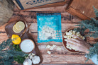 Creamy Ranch Cheese Curds by Cheese Brothers, Inc., showing fresh, white cheese curds in a rustic setting.