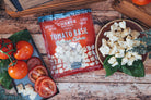 Fresh Tomato Basil Cheese Curds by Cheese Brothers, Inc. showing creamy cheese curds with fresh tomato and basil pieces.