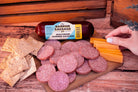 Sliced Barron Sausage Co. Summer Sausage from Cheese Brothers Inc., showing its cured, seasoned meat with a rich, savory appearance.