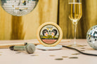 Slices of smoked provolone cheese from Cheese Brothers, Inc., showcasing its rich, smoky flavor and smooth, pale yellow texture.