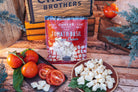Deluxe Char-CURD-erie gift box from Cheese Brothers, Inc. featuring assorted cheeses and curated gift bundle.