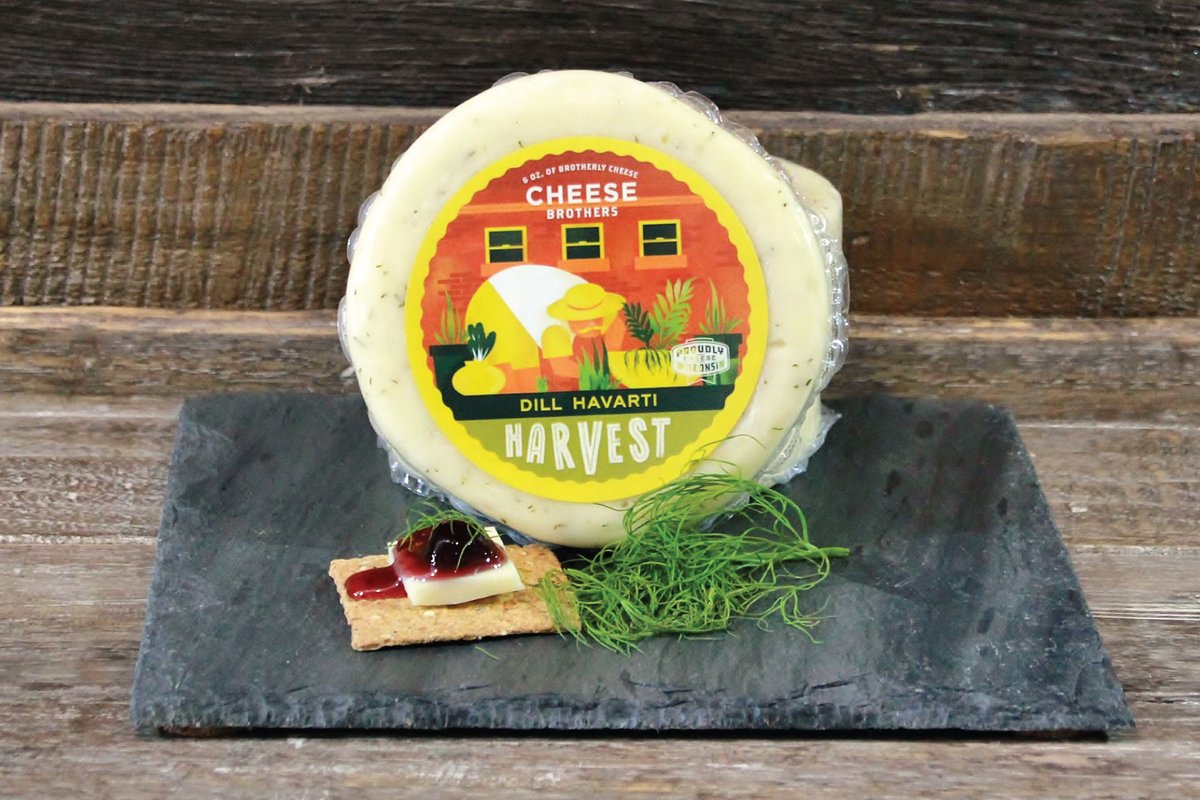 Cheese Brothers, Inc. "Have a Cheesy Birthday" gift basket with assorted cheeses, snacks, and festive packaging.