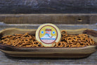 Cheesy birthday gift basket from Cheese Brothers Inc. with assorted cheeses, snacks, and birthday-themed items.