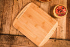 Cheese Brothers Inc. Just About Everything gift box with an 11-inch cutting board and assorted cheese and snack items.