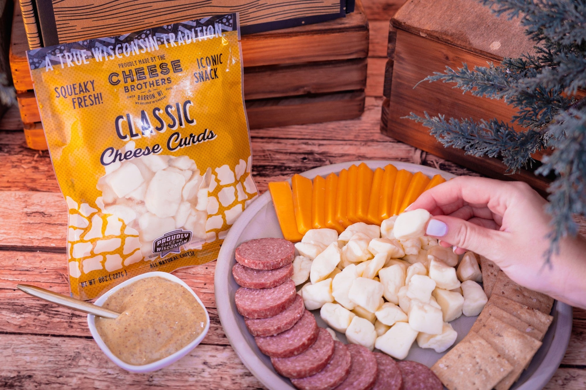 Cheese Brothers Inc. Char-CURD-erie Box gift set featuring assorted cheese curds in a decorative box.