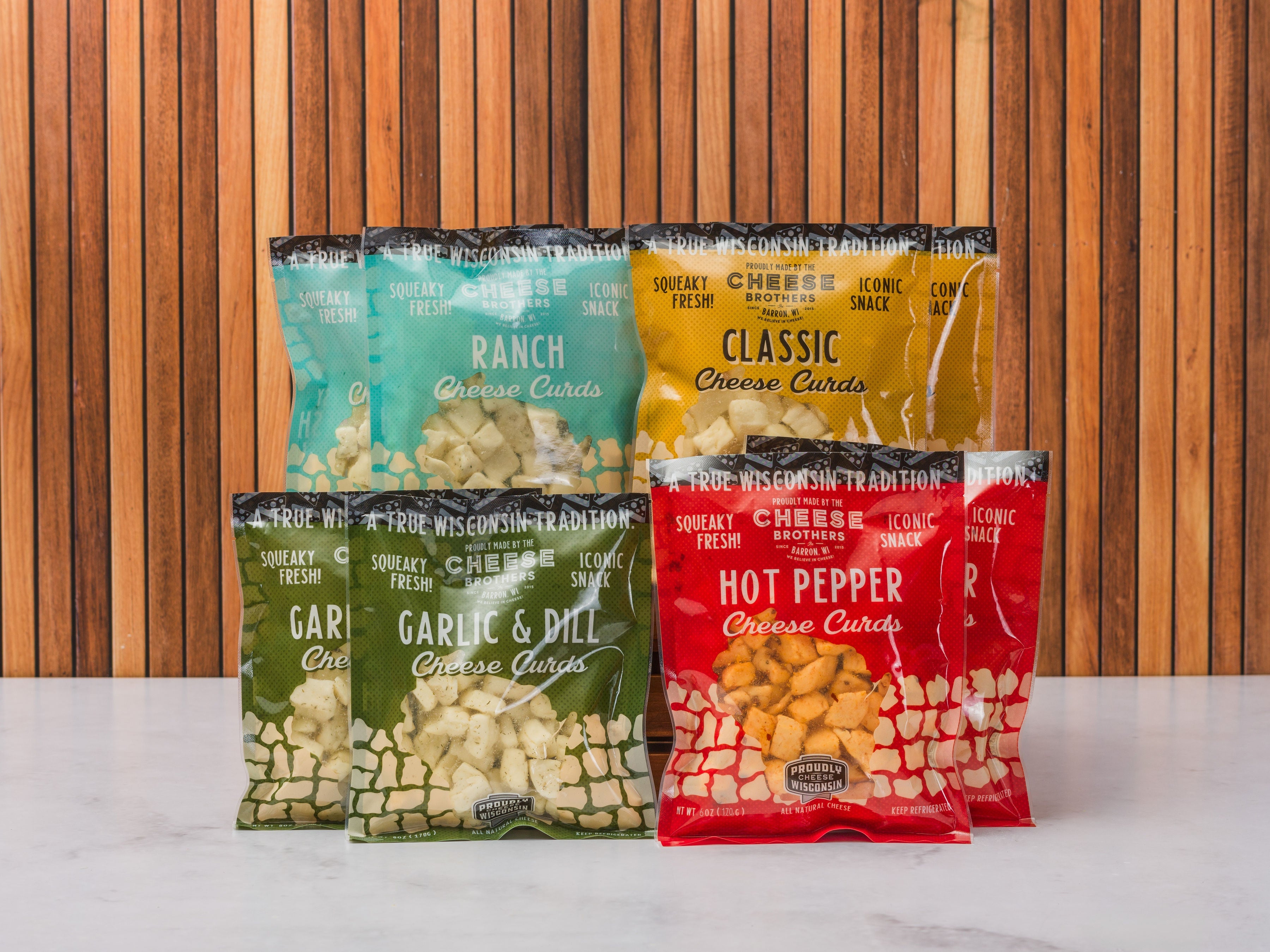 Wisconsin Cheese Brothers, Inc. cheese curds sampler with 8 fresh, golden cheese curds perfect for gift or snacking.