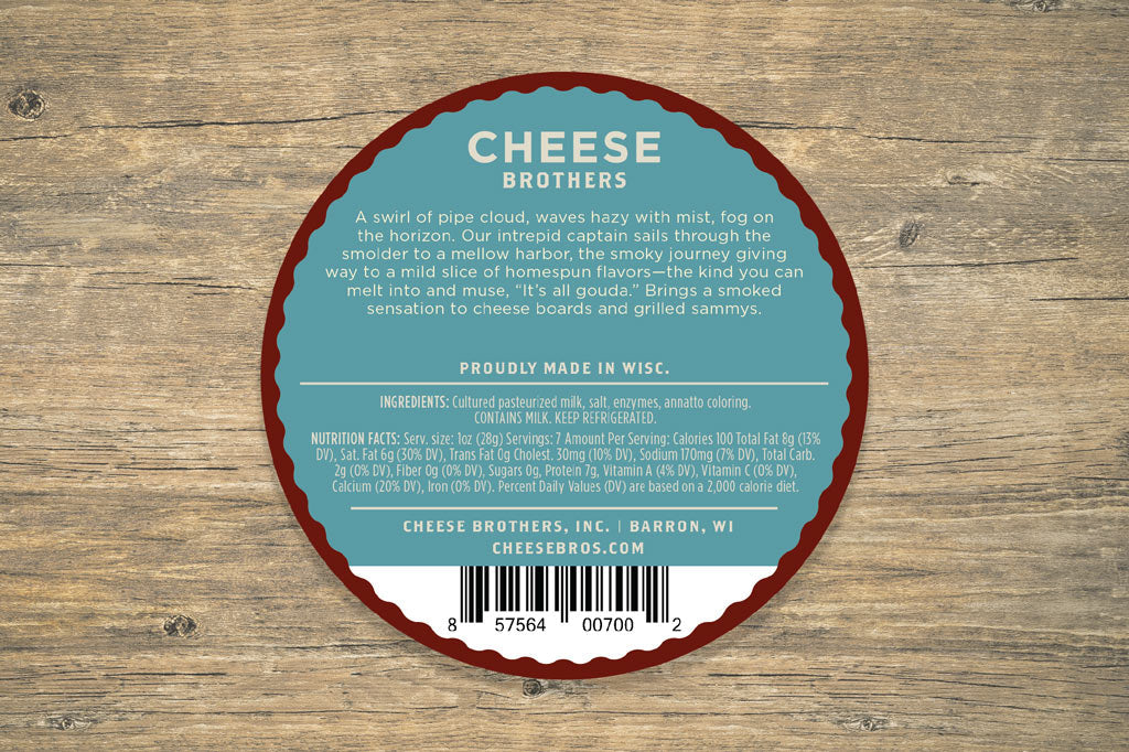 A wedge of smoked Gouda cheese from Cheese Brothers, Inc., showing its rich, smoky flavor and smooth, golden texture.