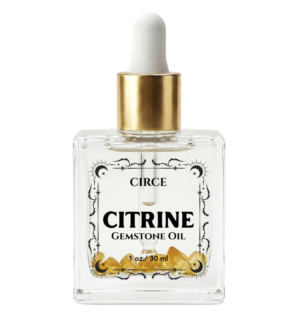 Citrine Body Oil from Circe Boutique featuring a clear glass bottle with golden-colored oil, ideal for glow and abundance rituals.