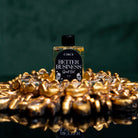 Better Business Spell Oil by Circe Boutique, success and entrepreneurial ritual oil in a glass bottle with a golden label.