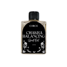 Chakra Balancing Oil from Circe Boutique with a dropper, in a glass bottle, for energy alignment and spiritual wellness.