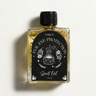 Evil Eye Protection Oil by Circe Boutique in a glass bottle with a dropper, used for ritual shielding and anointing.