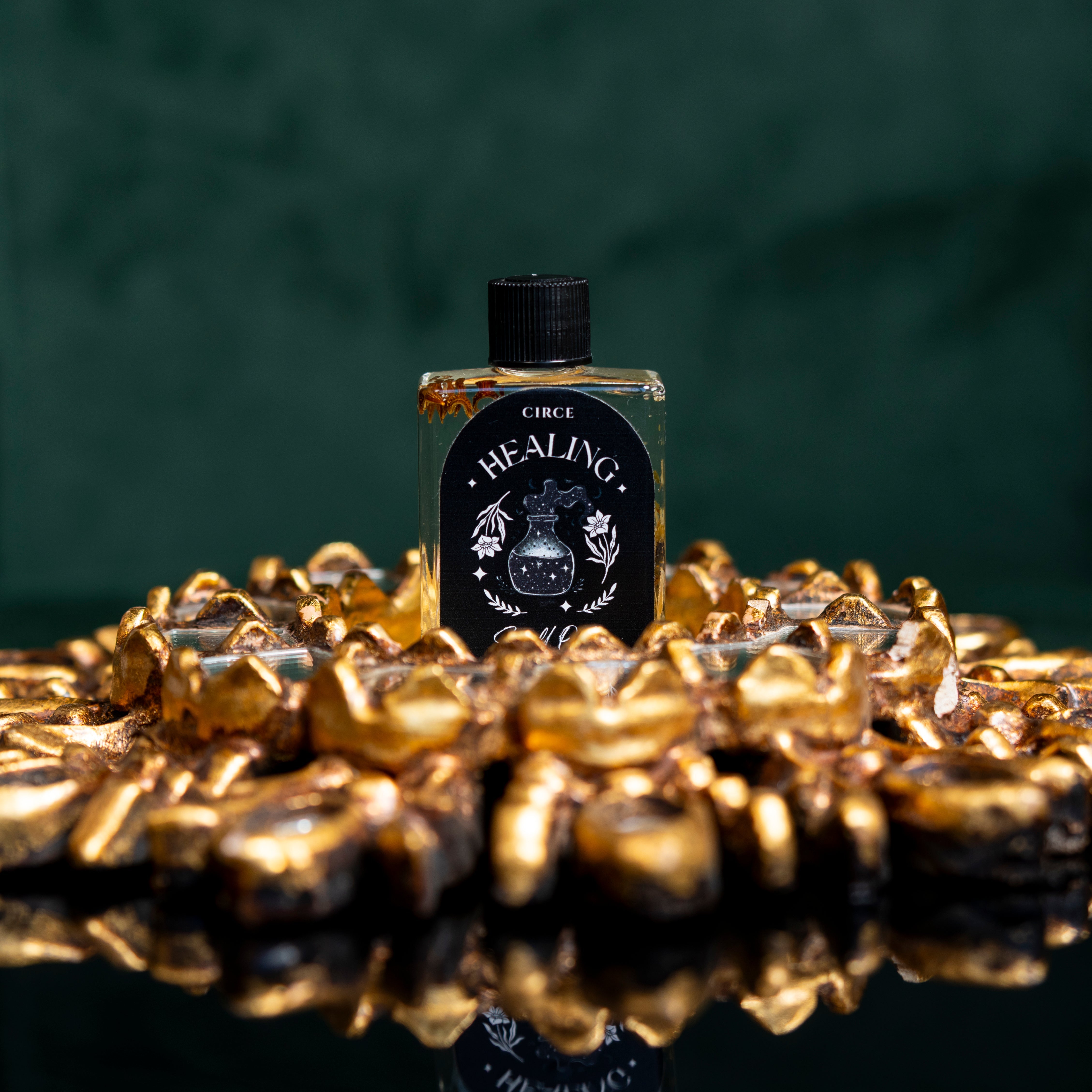 Healing Ritual Oil by Circe Boutique in a glass bottle with dropper, used for emotional and spiritual recovery.
